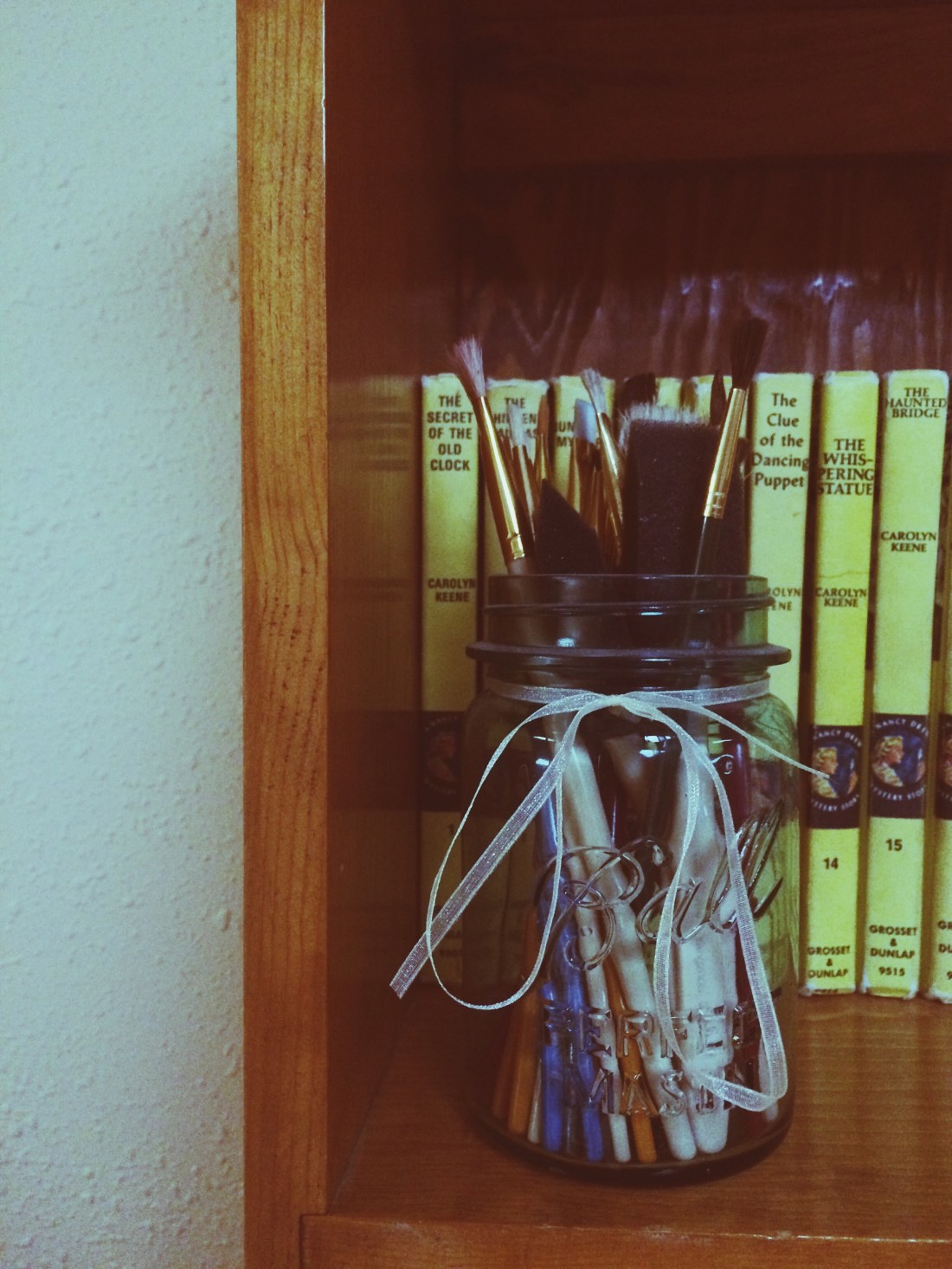 This is probably the awkwardest picture of a jar of paint brushes you will ever see.  One day, a long time ago, I thought I was going to be an artist. The dream died but I still like to look at my brushes because I think they are more pretty then my paintings. 